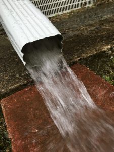 Gutter pouring water