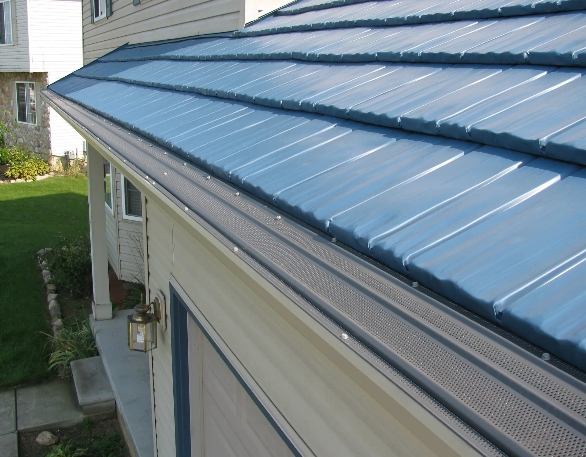 Seamless gutter installation on a DeWitt Michigan home